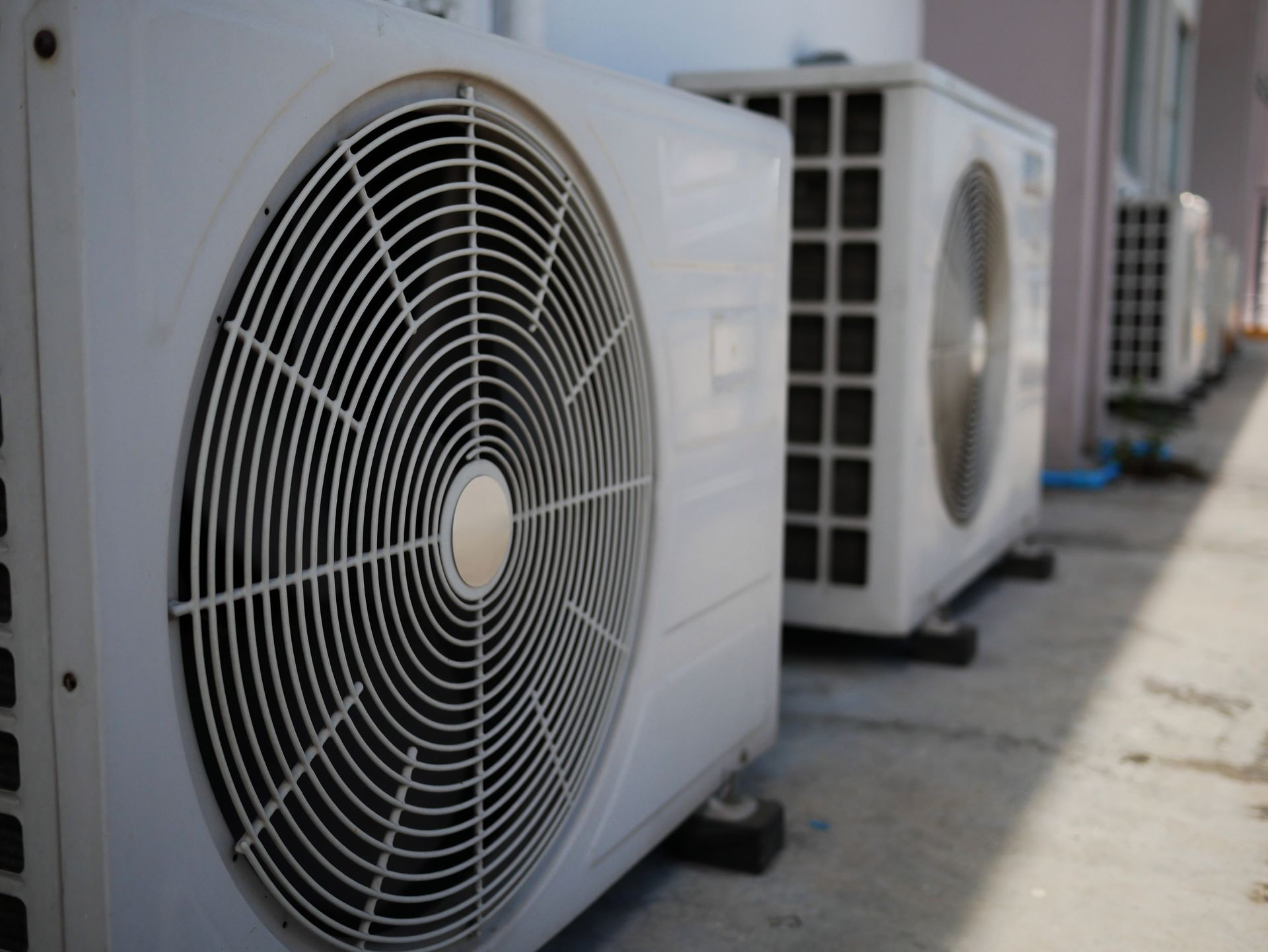 air conditioner compressor outside building.