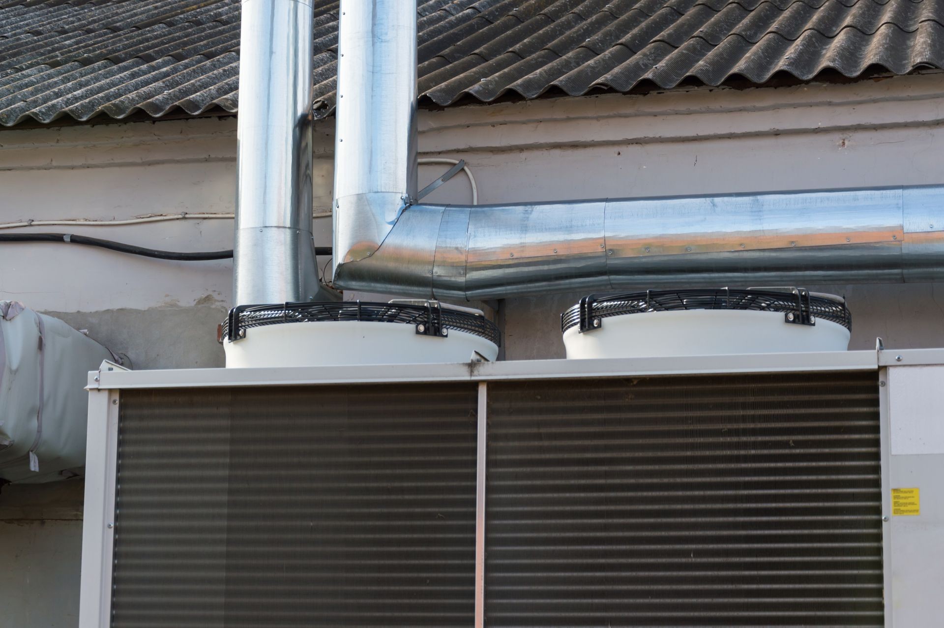 Close-up view of the fans of commercial cooling unit for central ventilation system